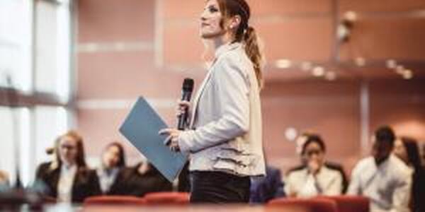 Woman presenting to group